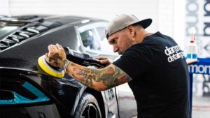 Owner Paul applying ceramic paint protection to a new vehicle